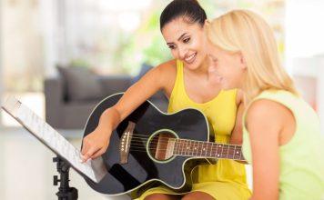 Become a Guitar Teacher: Expert Tips & Advice guitar teacher 768x512 2