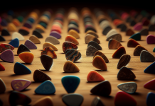 how different types of guitar picks effect the tone of your guitar sound